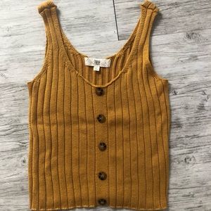 Mustard yellow ribbed tank top.